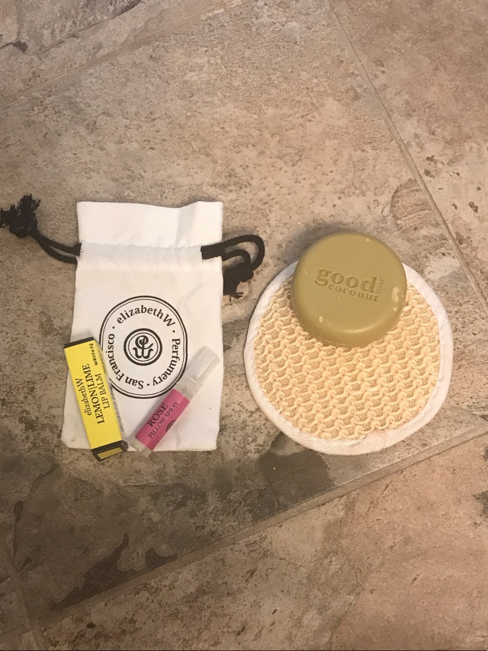 Good bath bar/ exfoliating pad and samples (lip balm and pillow spray)